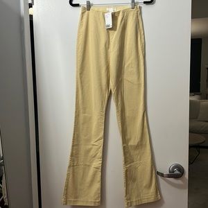 Yellow flare pants. H&M new with tags size 4!